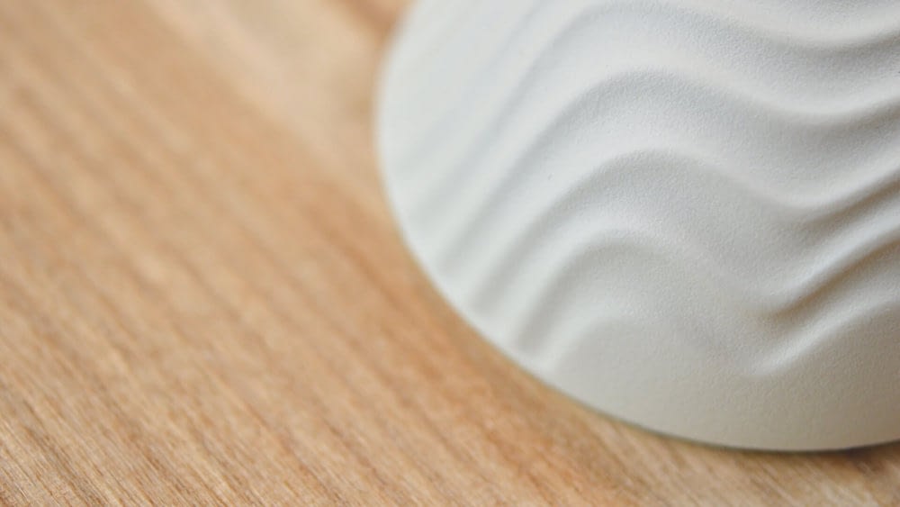 Medium DomeSeashell with contours reminscent of windswept sand, or lines of ocean swell